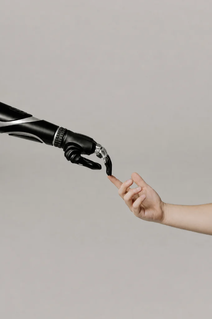 Human and robot fingertip touch symbolizing connection