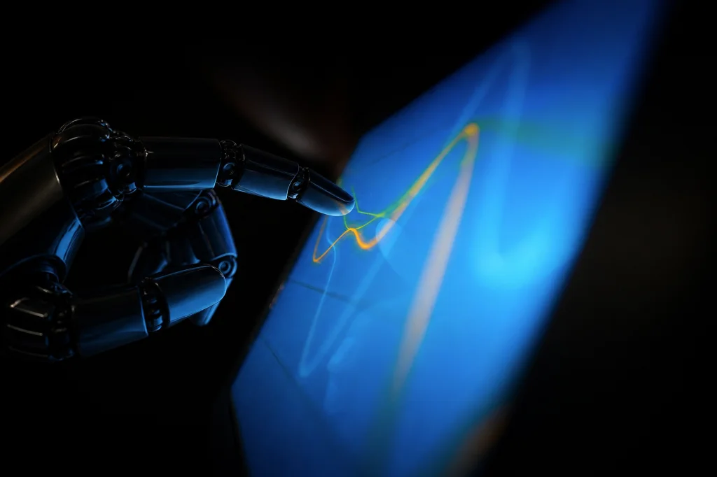 Robotic hand interacting with a technical tablet